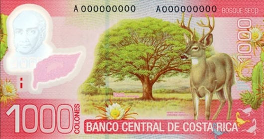 Colorful Costa Rican 1000 Colones banknote featuring Braulio Carrillo Colina and a white-tailed deer.