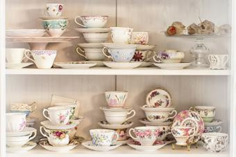 Vintage China Cabinet With Antique Tea Cup Collection