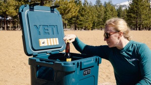 Yeti Roadie 48 wheeled cooler in a outdoor setting