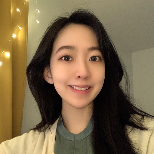 Evelyn He, Compliance and Operations Associate at Business Insider, smiling with fairy lights in the background.