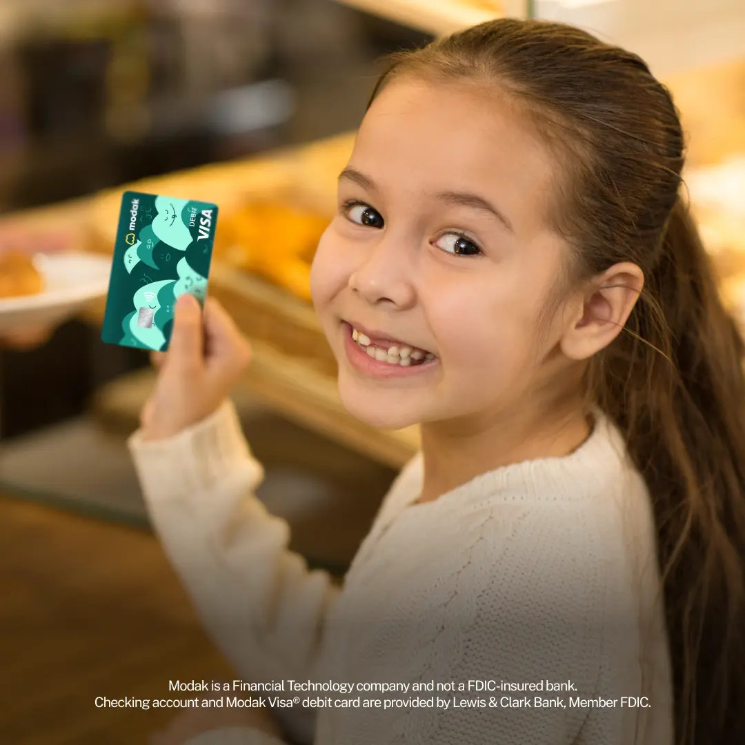  Kid with her Modak VISA debit card