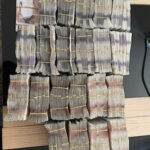 Bundles of cash seized during the Jersey investigation.