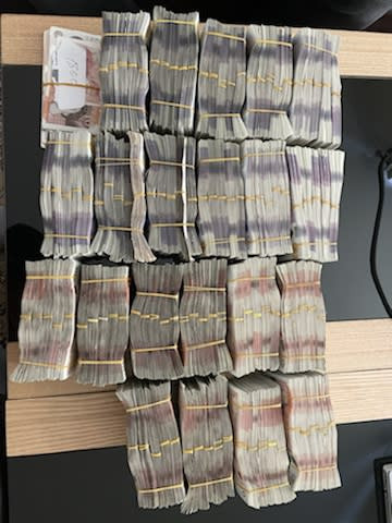 Bundles of cash seized during the Jersey investigation.