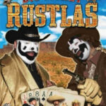 Violent J as Big Baby Chips in Big Money Rustlas, with clown makeup and a scraggly beard, embodying a comical villain.