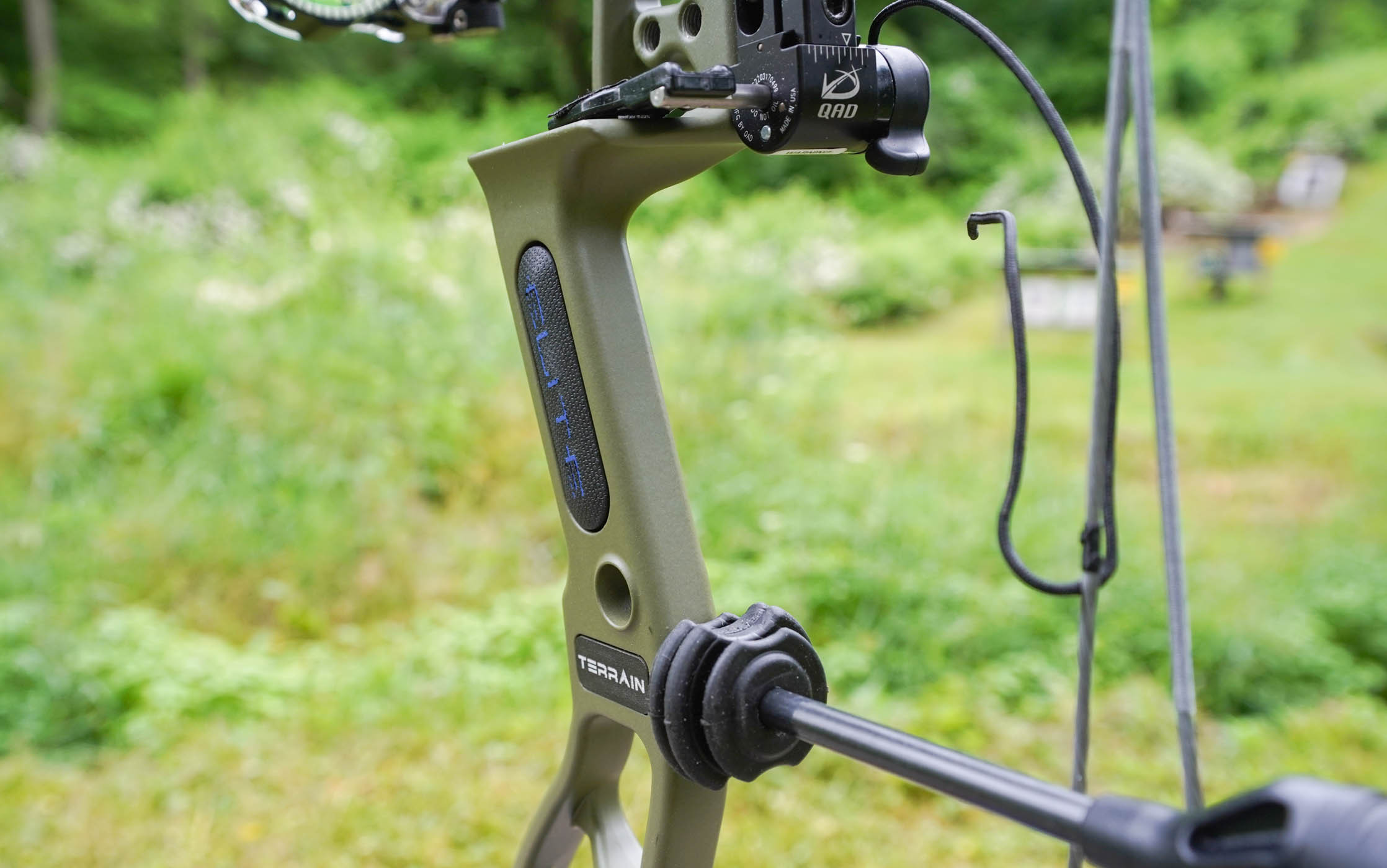 Close-up on the grip of the Elite Terrain compound bow.