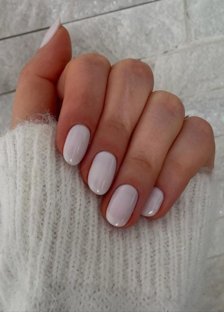 Milky white old money nails on short square shaped nails, opaque and creamy white color.