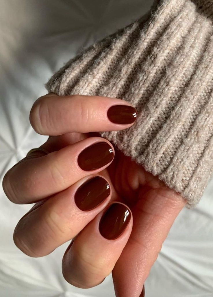 Brown old money nails on short square shaped nails, rich chocolate brown glossy color.