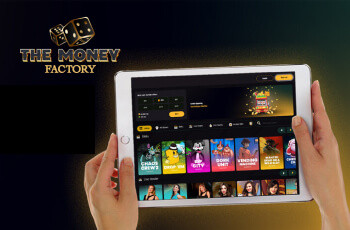 Laptop displaying The Money Factory Casino website, highlighting mobile gaming accessibility.