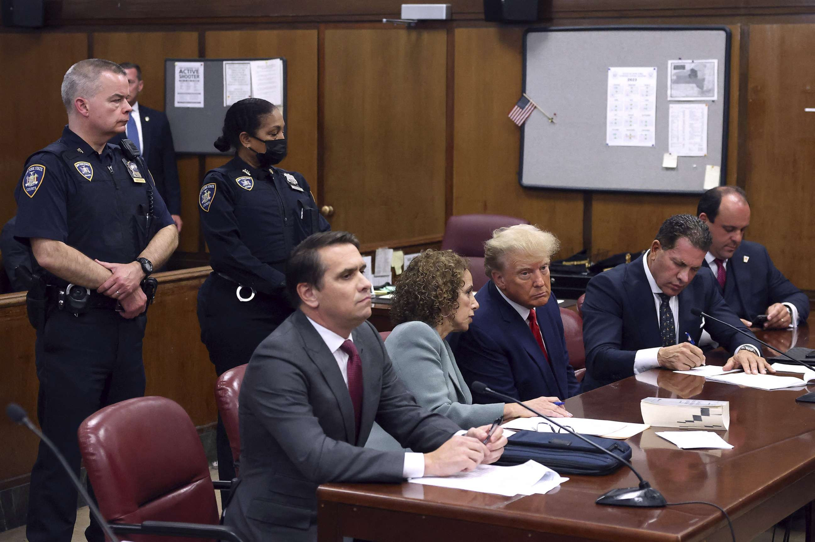 Former President Donald Trump appears in court with his legal team for an arraignment on charges stemming from his indictment by a Manhattan grand jury, in New York City, April 4, 2023.