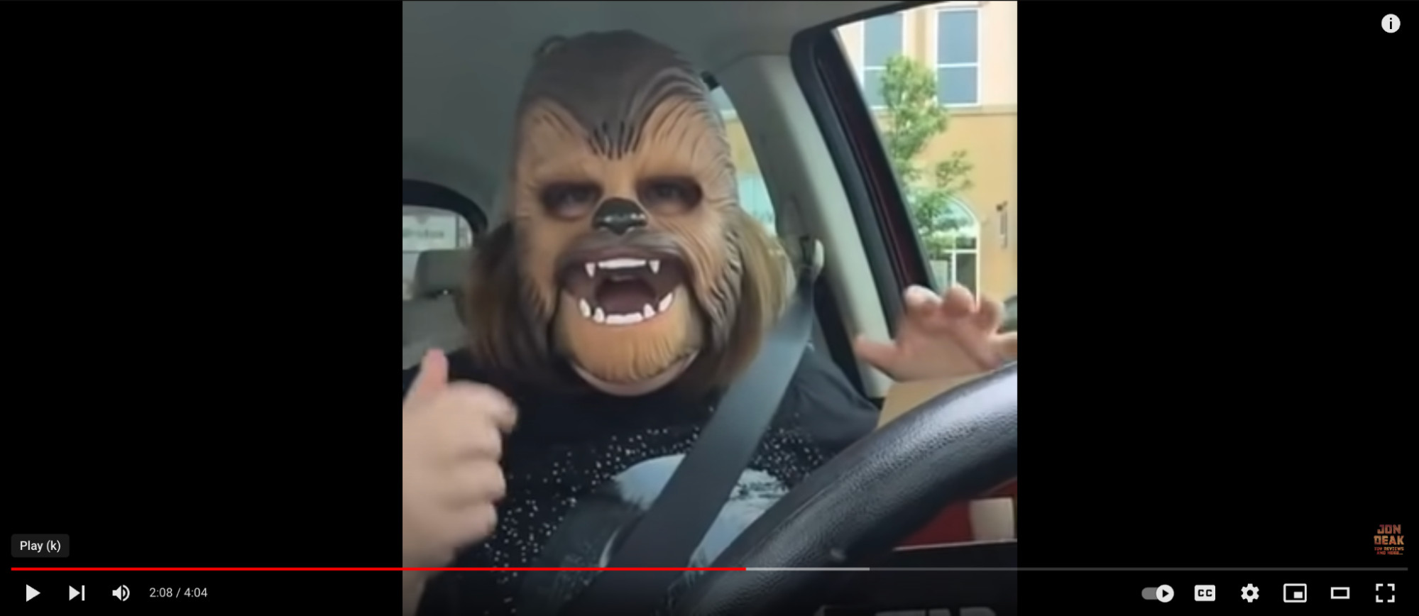 A woman wearing a Chewbacca mask in a viral YouTube video