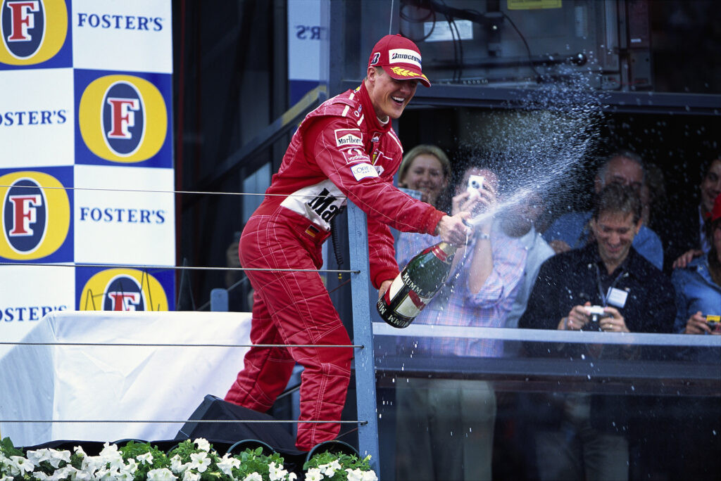 Michael Schumacher celebrating a race win.