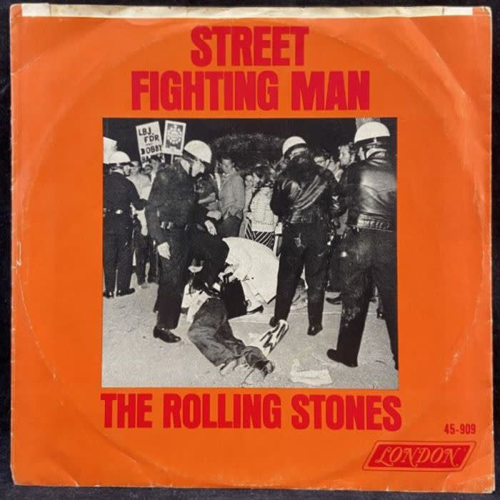 The Rolling Stones 'Street Fighting Man' album cover, depicting police brutality, contributing to its rarity and high collector's value.