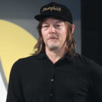 Norman Reedus attends a celebrity talk event during Osaka Comic Con at Intex Osaka in Osaka, Japan, showcasing his popularity and high salary from The Walking Dead