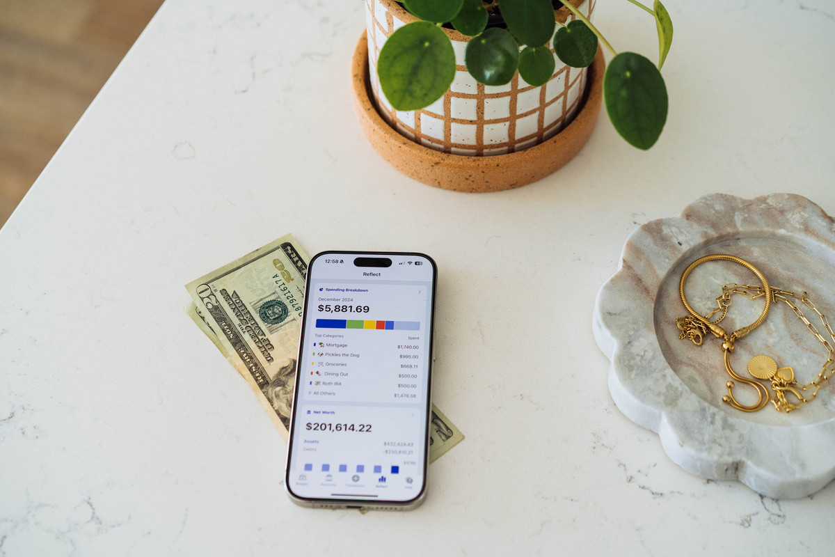 A smartphone displaying the YNAB (You Need a Budget) app interface, showing budget categories and available funds