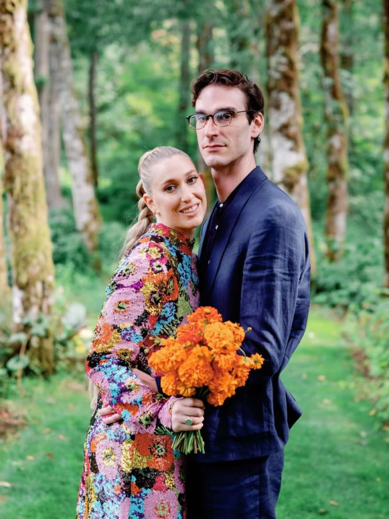 Marston Hefner, pictured with his wife Anna Lambropoulos, expressed gratitude for his financial security, which allows him to provide for his family. Courtesy of Marston Hefner