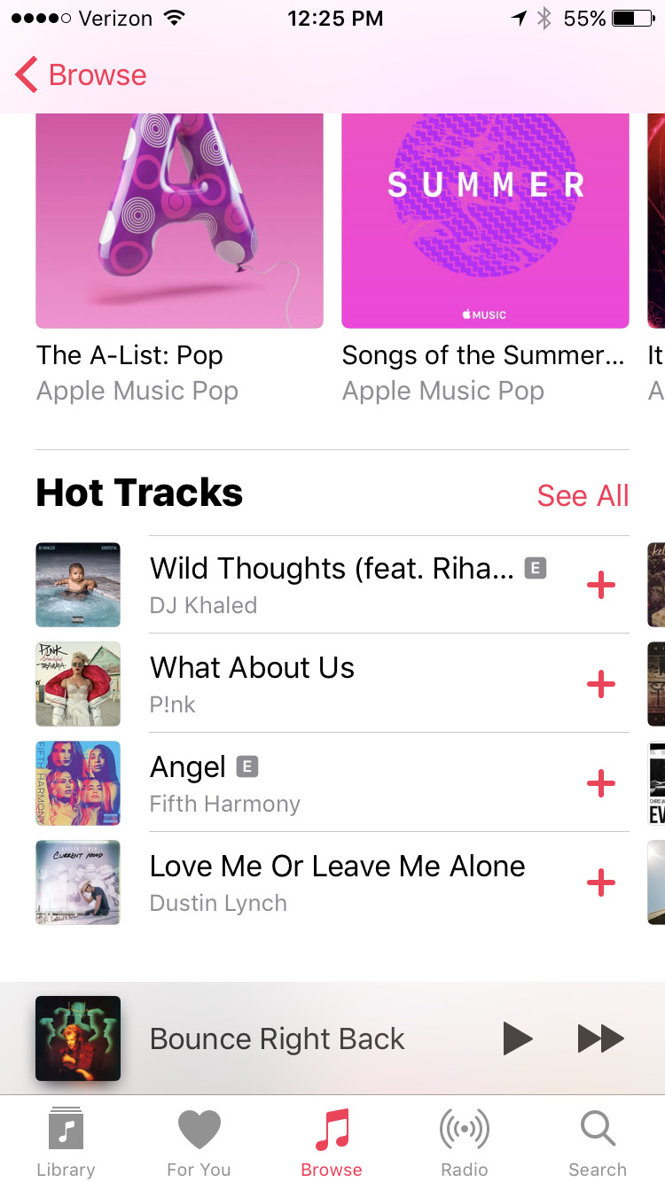 Person listening to music with Apple Music on their iPhone