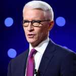 Anderson Cooper in a navy suit