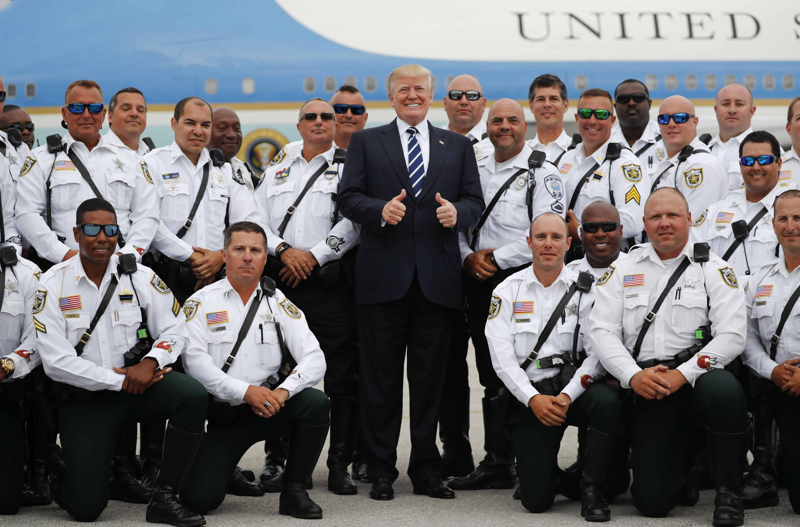 President Donald Trump with law enforcement officers