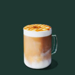 A cup of Starbucks Caramel Macchiato
