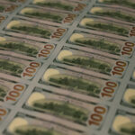 Stacks of one hundred dollar bills