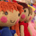 Crochet items displayed at a craft fair