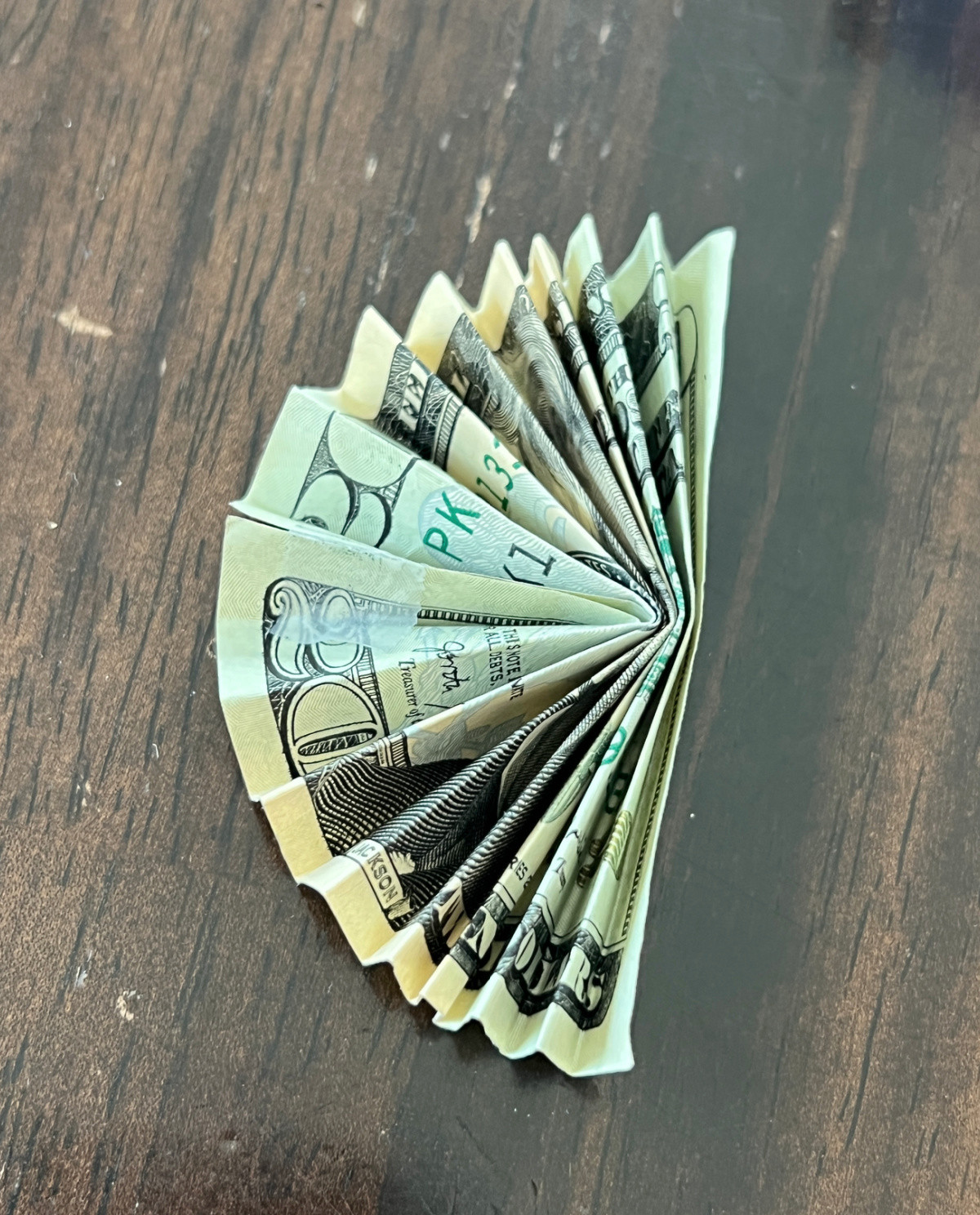 Various folding techniques for creating a money necklace