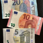Euro banknotes of different denominations and colors