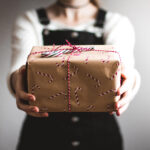 People giving each other gifts to celebrate the gift economy