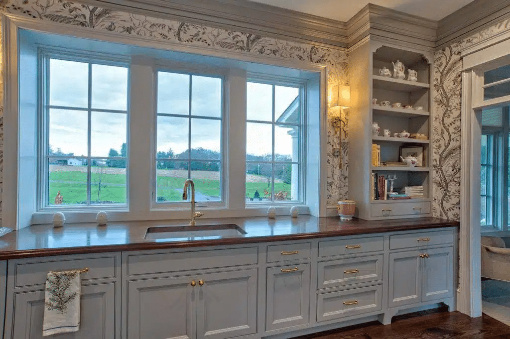 Elegant kitchen with dark wood cabinets and stainless steel appliances
