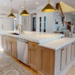 Kitchen with stylish white cabinets and granite countertops
