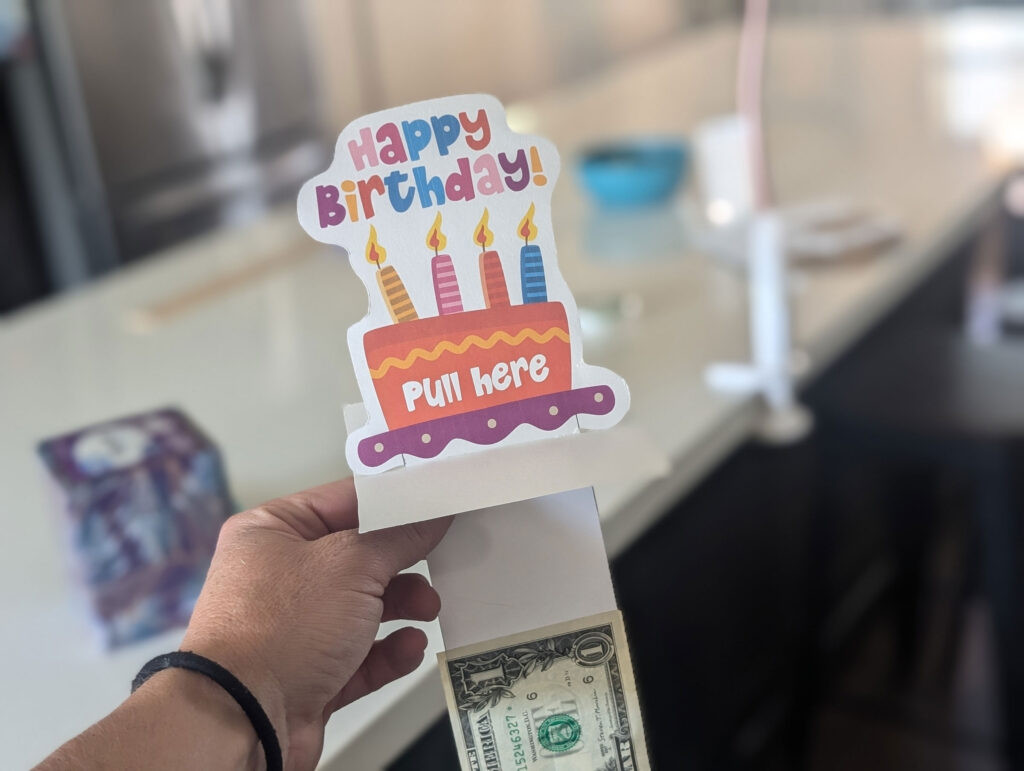 Insert the bills through the paper rectangle