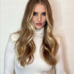 Soft money piece highlights with pearl blonde on medium blonde hair