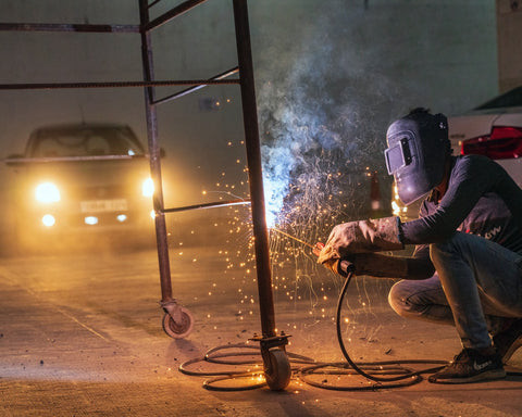 Combination welder working on a project that involves multiple welding techniques