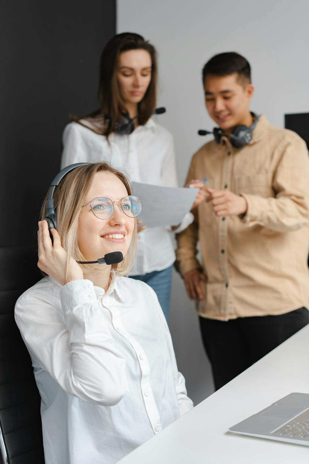 Person calculating expenses to minimize costs when using a credit card for a money order, focusing on low fees and immediate balance repayment