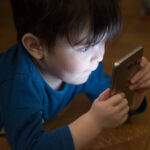 Man using mobile phone addiction phone mobile communication screen child education
