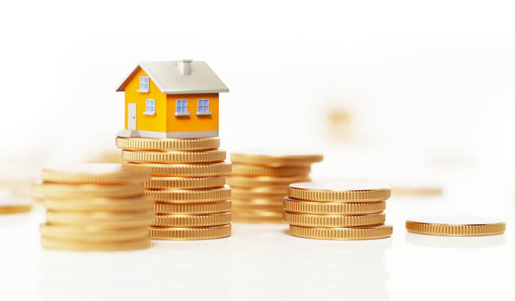 small yellow house on coins