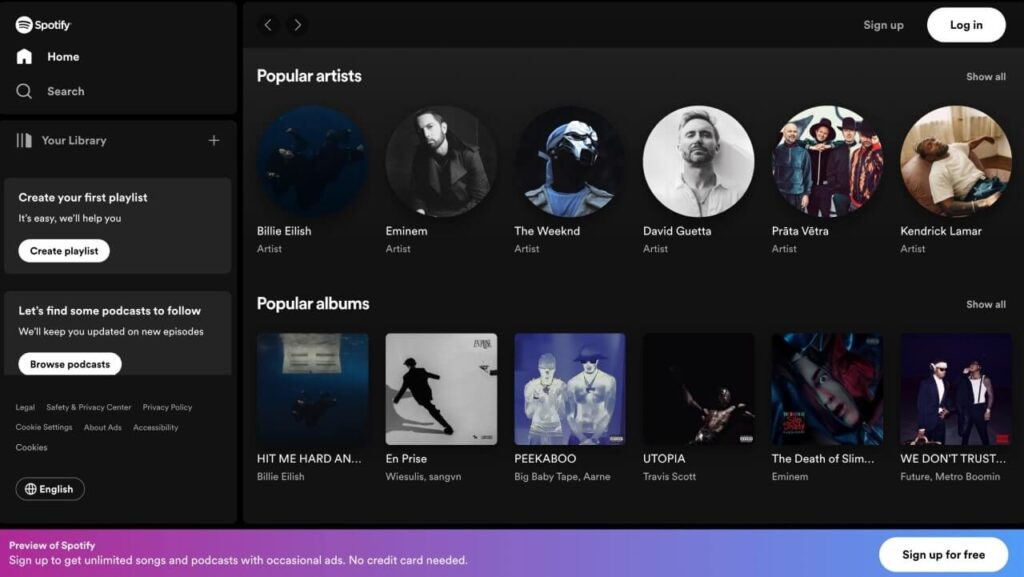 Musician with laptop and headphones calculating spotify revenue royalty earnings