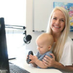 Mother and child working on a blog post about making money from home.