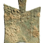 Spade-shaped coin