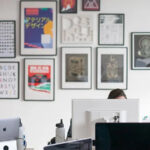 workspace with two people working at computers