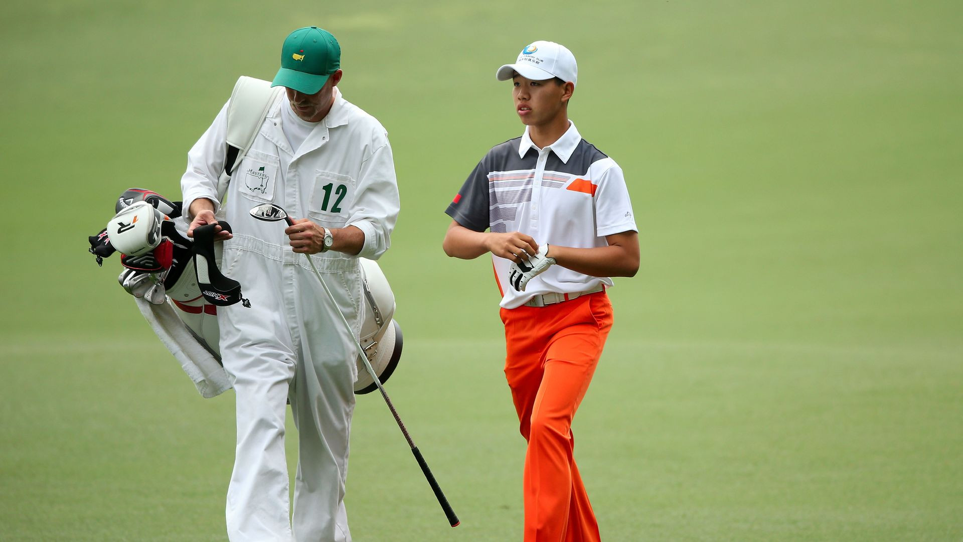 Guan Tianlang at the 2013 Masters showcasing amateur golf dedication